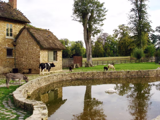 Marie-Antoinette’s hamlet at Versailles — a working farm complete with domestic animals and thatched-roof houses — is becoming increasingly popular with travelers. 